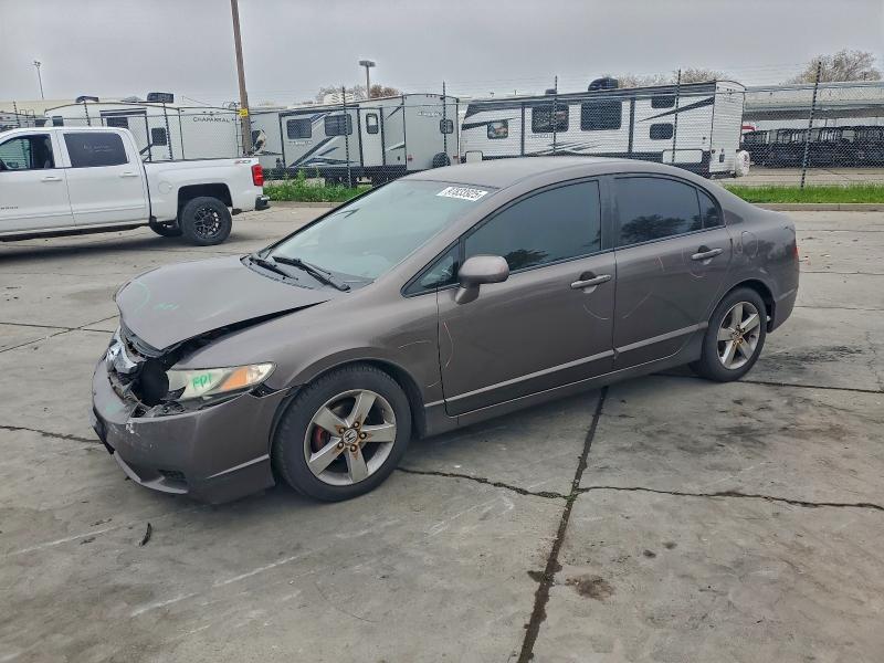 Photo 1 from auction – 2010 HONDA CIVIC LX with VIN 19XFA1F56AE050149
