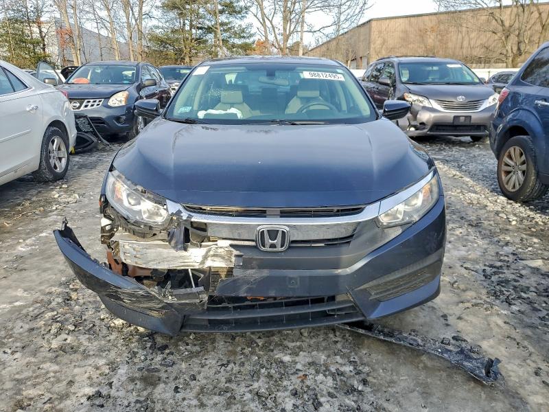 Photo 5 from auction – 2017 HONDA CIVIC EX with VIN 19XFC2F72HE228246