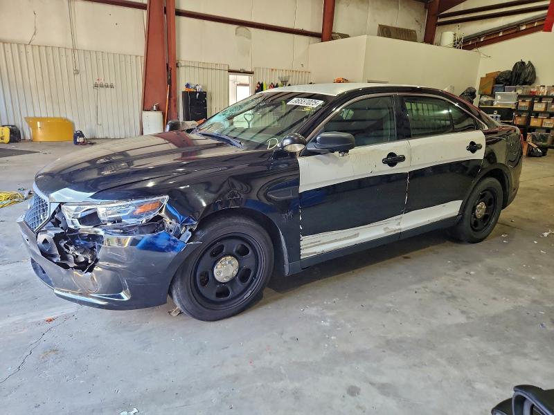 FORD TAURUS POL 2015 with VIN 1FAHP2MK9FG159952 - Photo from auction