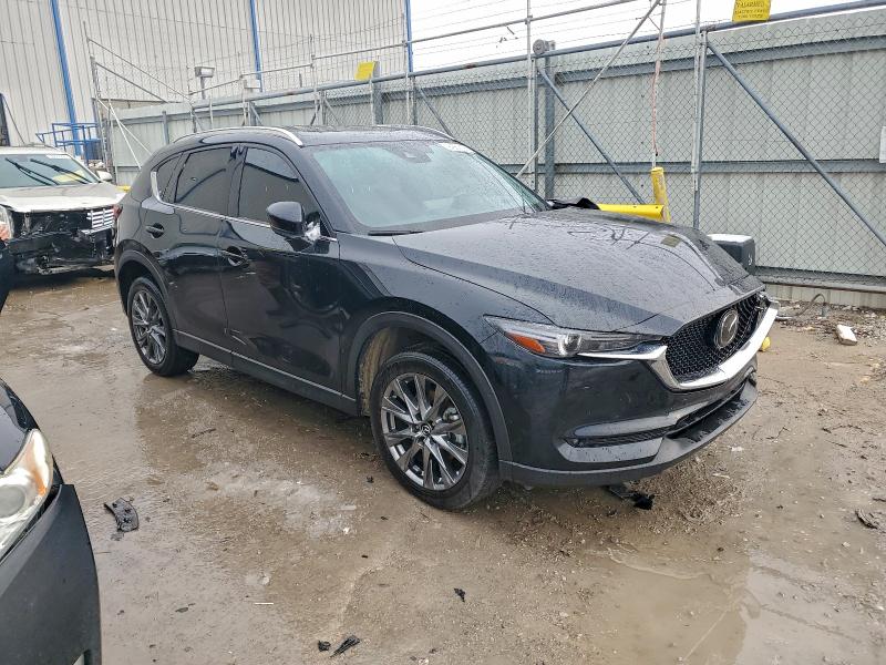 Photo 4 from auction – 2021 MAZDA CX-5 SIGNA with VIN JM3KFBEY2M0360823