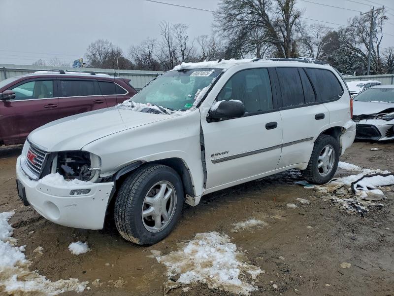 GMC ENVOY 2006 with VIN 1GKDT13S062262405 - Photo from auction