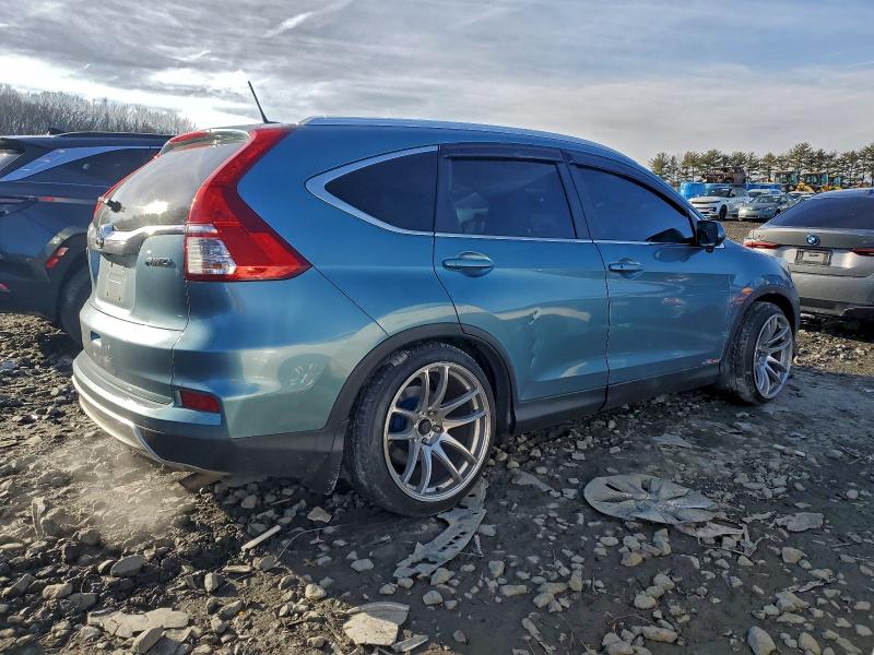 Photo 3 from auction – 2015 HONDA CR-V EXL with VIN 2HKRM4H79FH601181