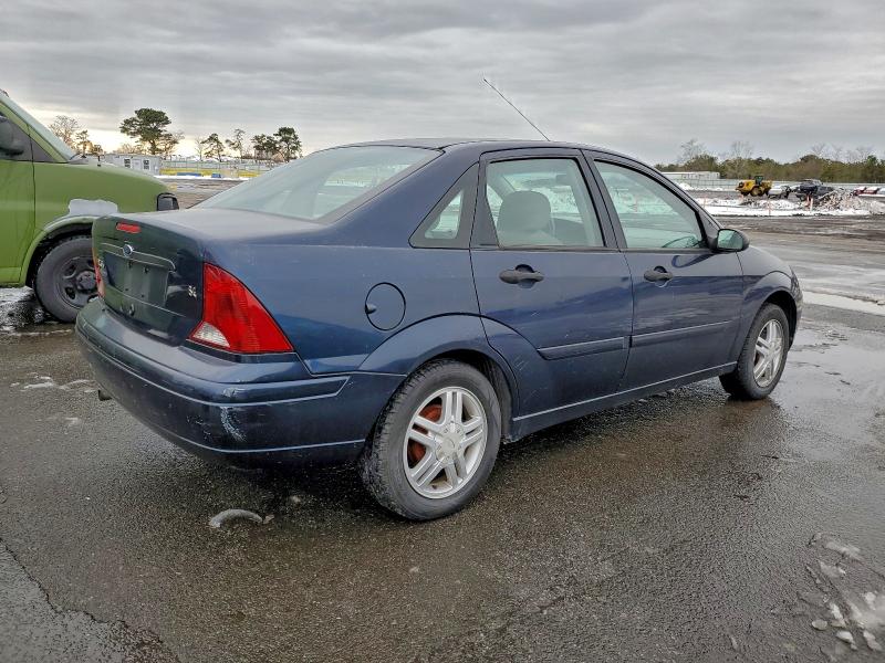 Photo 3 from auction – 2003 FORD FOCUS with VIN 1FAFP34303W294230
