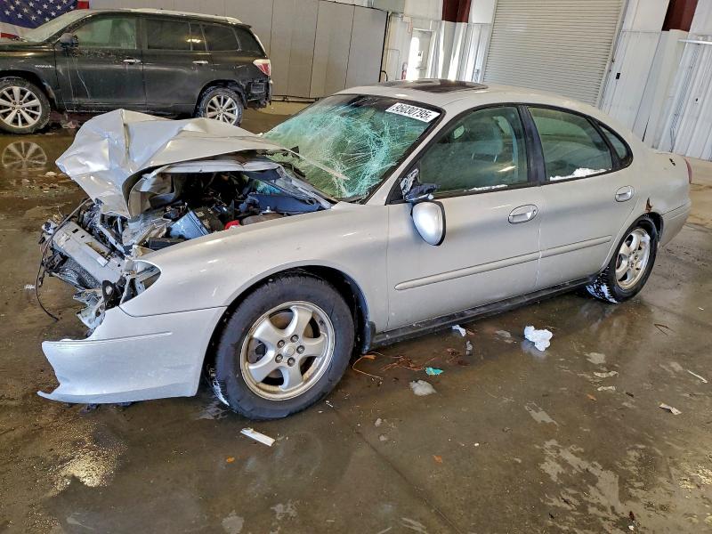 FORD TAURUS SES 2002 with VIN 1FAFP55UX2G221541 - Photo from auction