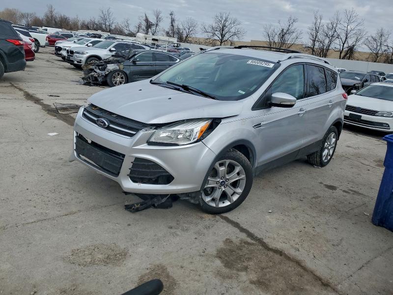 FORD ESCAPE TIT 2014 with VIN 1FMCU0JX4EUB79801 - Photo from auction