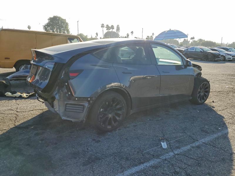 Photo 3 from auction – 2023 TESLA MODEL Y with VIN 7SAYGDED5PF962441