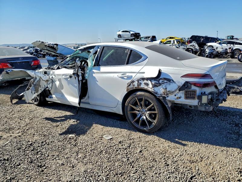 Photo 2 from auction – 2022 GENESIS G70 with VIN KMTG34TA0NU089281