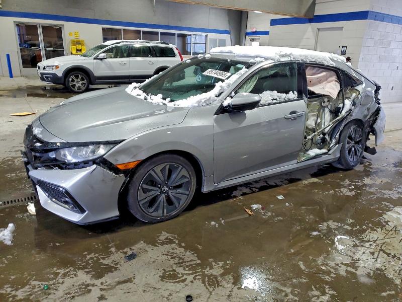 HONDA CIVIC 2018 with VIN SHHFK7H58JU415923 - Photo from auction