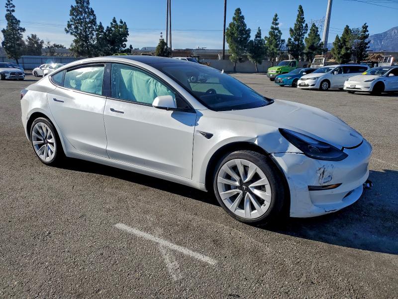 Photo 4 from auction – 2022 TESLA MODEL 3 with VIN 5YJ3E1EA8NF124418
