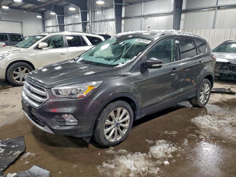 FORD ESCAPE TIT 2017 with VIN 1FMCU9JD5HUB57885 - Photo from auction