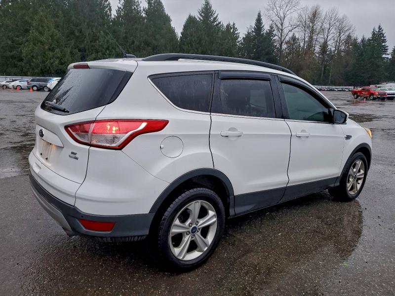 Photo 3 from auction – 2015 FORD ESCAPE SE with VIN 1FMCU9GX0FUB82000