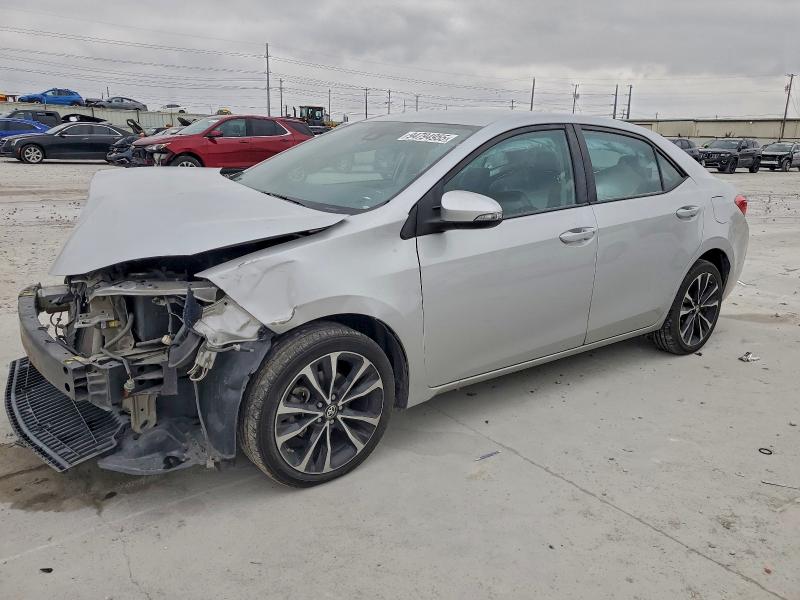 TOYOTA COROLLA L 2018 with VIN 5YFBURHE4JP798950 - Photo from auction