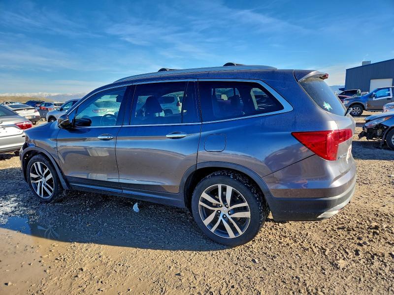 Photo 2 from auction – 2016 HONDA PILOT TOUR with VIN 5FNYF6H98GB011346