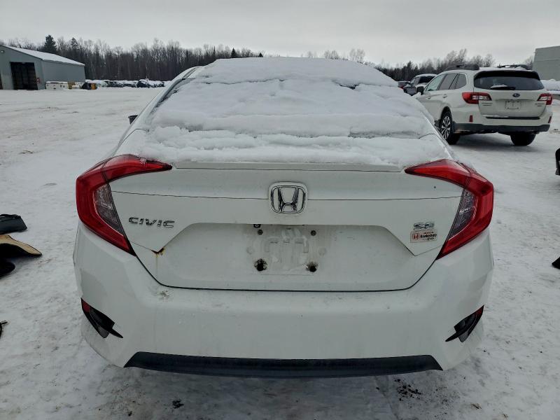 Photo 6 from auction – 2018 HONDA CIVIC LX with VIN 2HGFC2F62JH040068