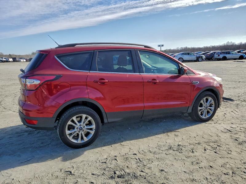 Photo 3 from auction – 2017 FORD ESCAPE SE with VIN 1FMCU9G92HUD68223