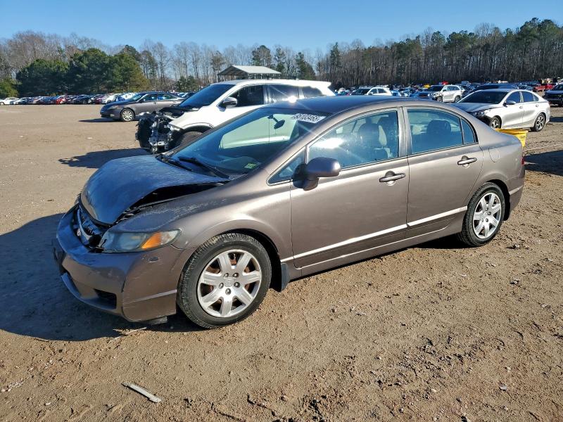 HONDA CIVIC LX 2011 with VIN 2HGFA1F51BH500801 - Photo from auction