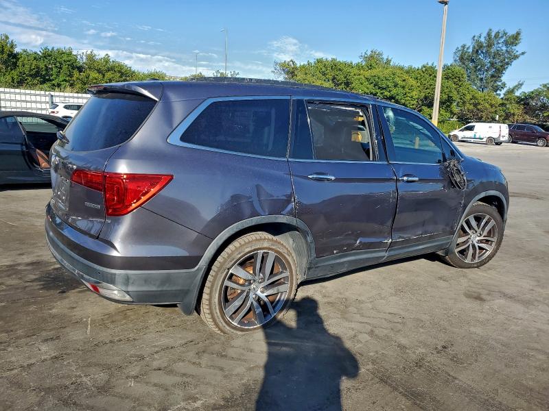 Photo 3 from auction – 2017 HONDA PILOT TOUR with VIN 5FNYF5H96HB026875