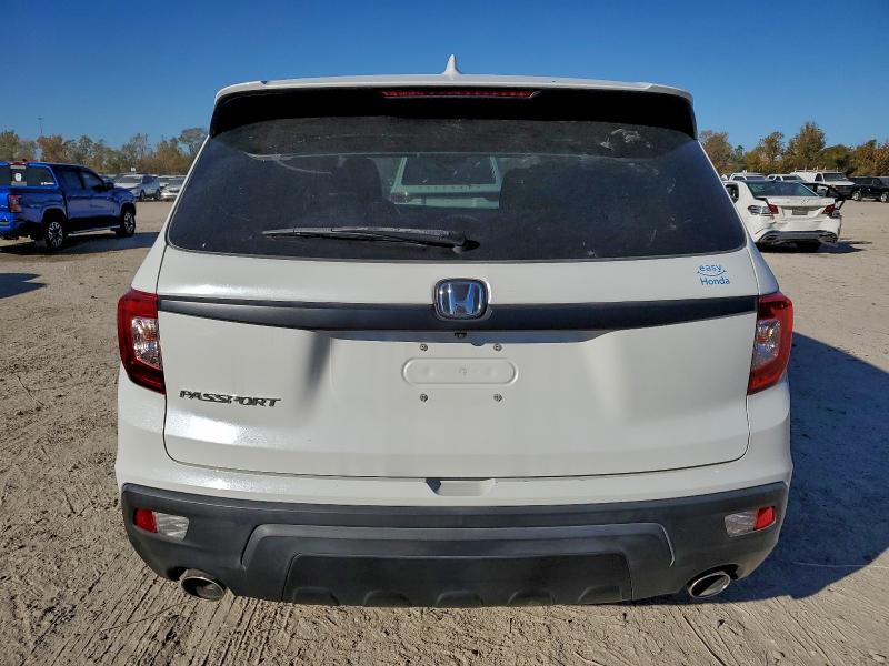 Photo 6 from auction – 2021 HONDA PASSPORT E with VIN 5FNYF7H51MB008416