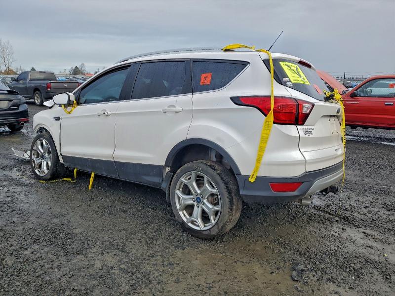 Photo 2 from auction – 2019 FORD ESCAPE TIT with VIN 1FMCU9J94KUA35201