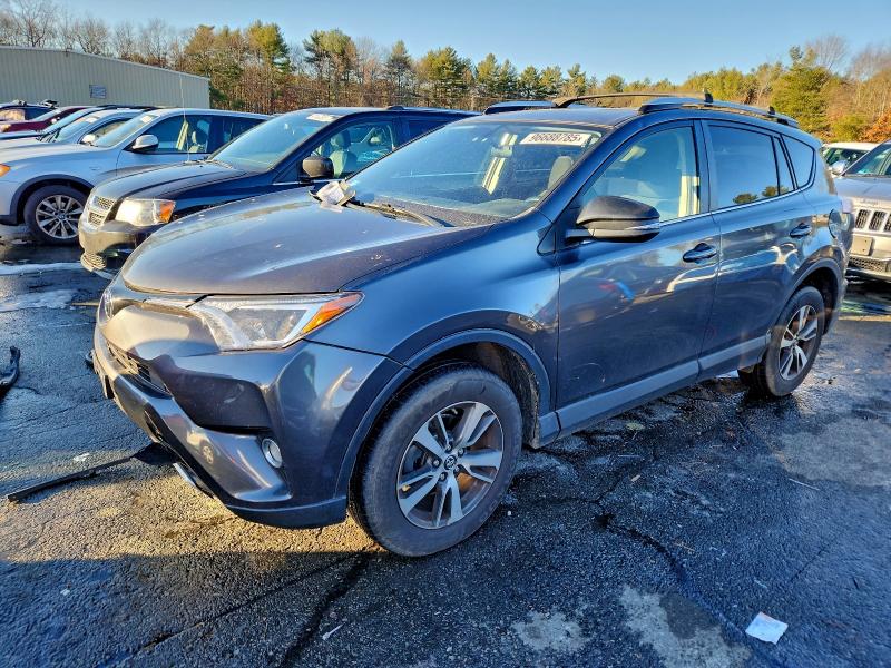 TOYOTA RAV4 XLE 2016 with VIN JTMRFREV3GJ073429 - Photo from auction