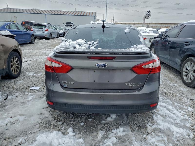 Photo 6 from auction – 2014 FORD FOCUS with VIN 1FADP3J27EL329935