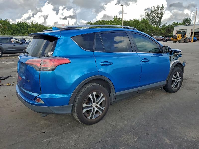 Photo 3 from auction – 2018 TOYOTA RAV4 LE with VIN JTMZFREV2JJ177627