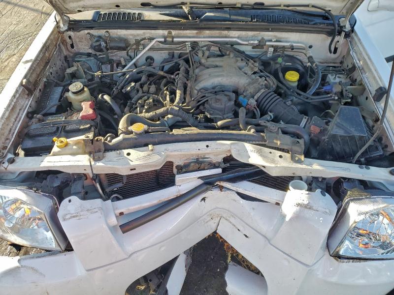 Photo 11 from auction – 2002 NISSAN FRONTIER C with VIN 1N6ED29X02C305230