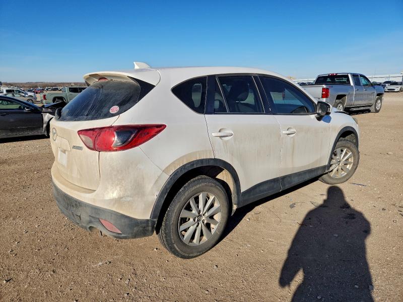 Photo 3 from auction – 2013 MAZDA CX-5 with VIN JM3KE4CE2D0120307