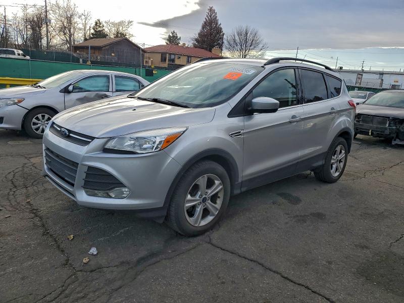 FORD ESCAPE SE 2016 with VIN 1FMCU0GX5GUC33701 - Photo from auction