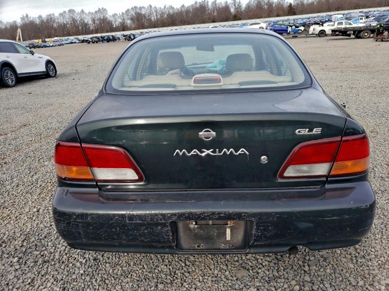 Photo 6 from auction – 1997 NISSAN MAXIMA GLE with VIN JN1CA21D3VM536368