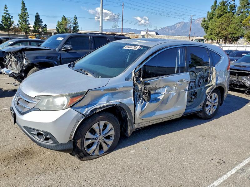 Photo 1 from auction – 2014 HONDA CR-V EX with VIN 2HKRM3H58EH535665