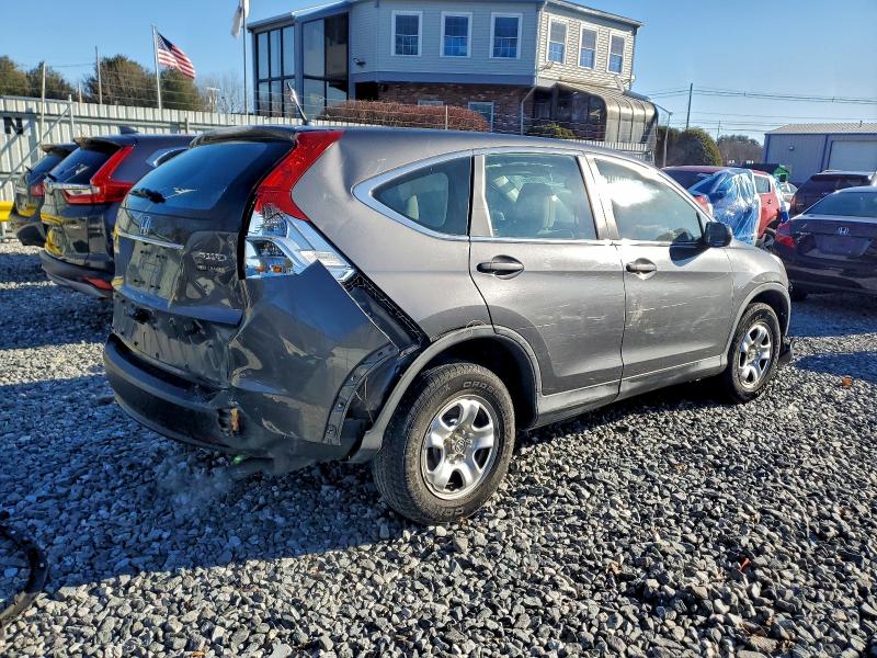 Photo 3 from auction – 2014 HONDA CR-V LX with VIN 2HKRM4H36EH710046
