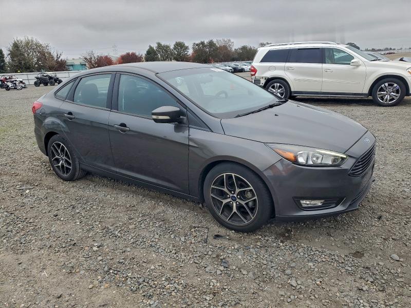 Photo 4 from auction – 2017 FORD FOCUS SE with VIN 1FADP3FE7HL219913