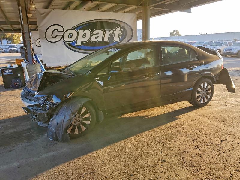 HONDA CIVIC EXL 2010 with VIN 2HGFA1F99AH506458 - Photo from auction