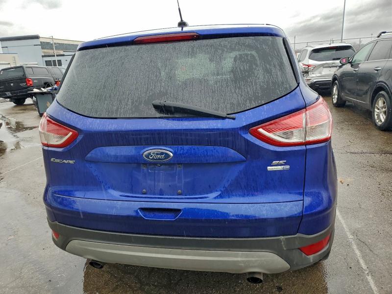 Photo 6 from auction – 2015 FORD ESCAPE SE with VIN 1FMCU9GX3FUC53559