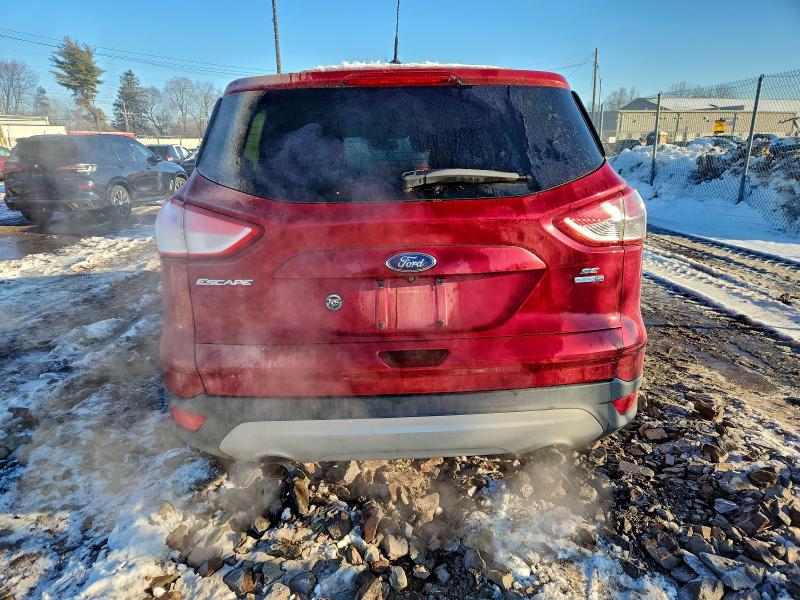 Photo 6 from auction – 2016 FORD ESCAPE SE with VIN 1FMCU9GX9GUA43520
