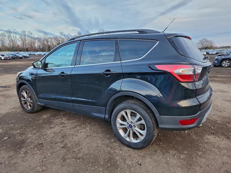 Photo 2 from auction – 2018 FORD ESCAPE SE with VIN 1FMCU0GD7JUA11710