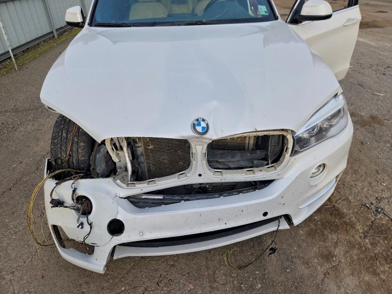 Photo 12 from auction – 2017 BMW X5 SDRIVE3 with VIN 5UXKR2C52H0U20631