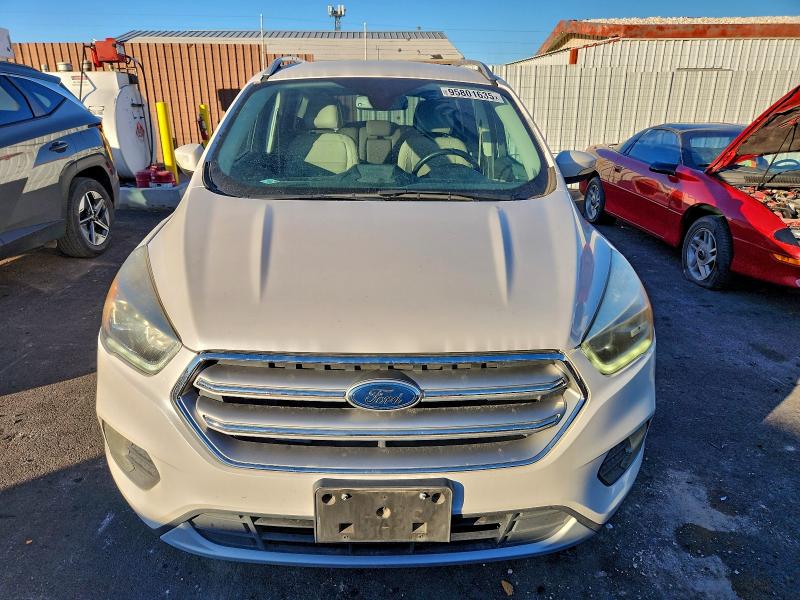 Photo 5 from auction – 2017 FORD ESCAPE with VIN 1FMCU0J90HUE97761