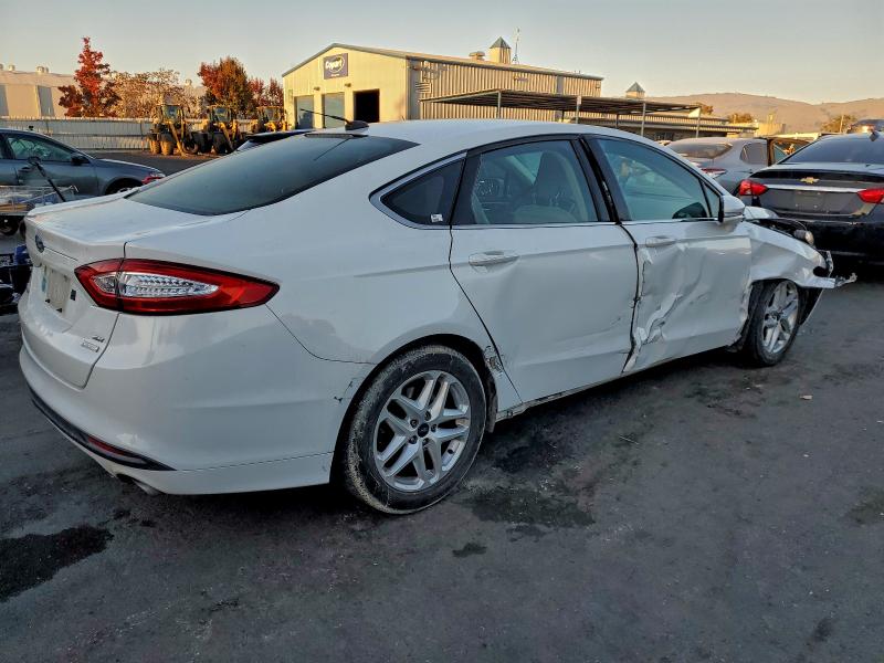 Photo 3 from auction – 2014 FORD FUSION SE with VIN 3FA6P0HD1ER257582