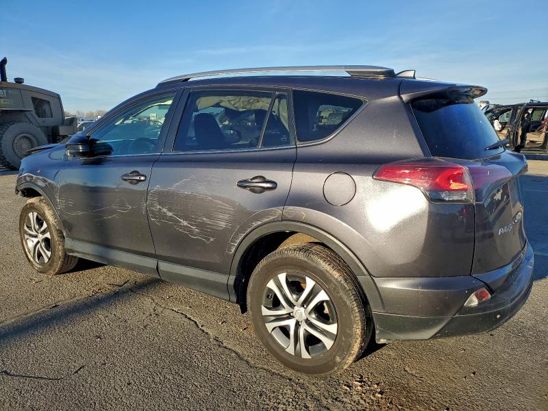 Photo 2 from auction – 2016 TOYOTA RAV4 LE with VIN JTMBFREV2GJ066604