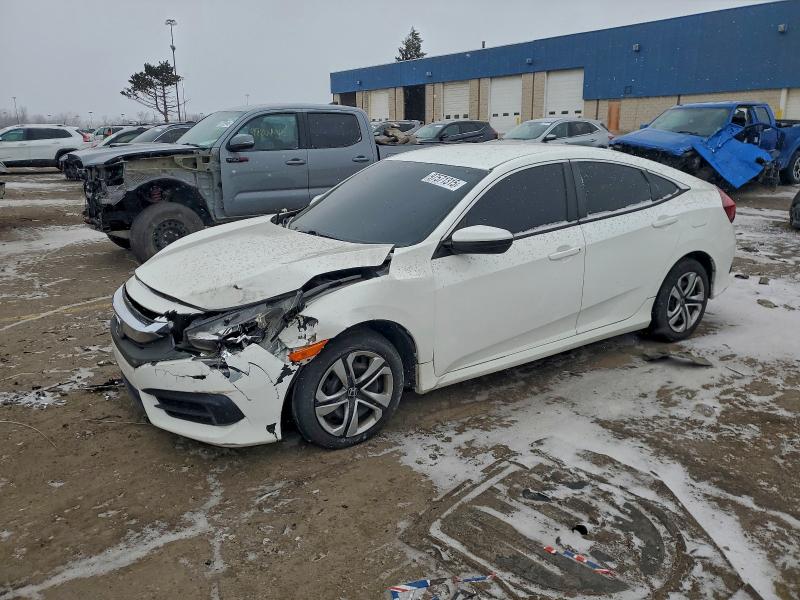 HONDA CIVIC LX 2018 with VIN 19XFC2F50JE004249 - Photo from auction