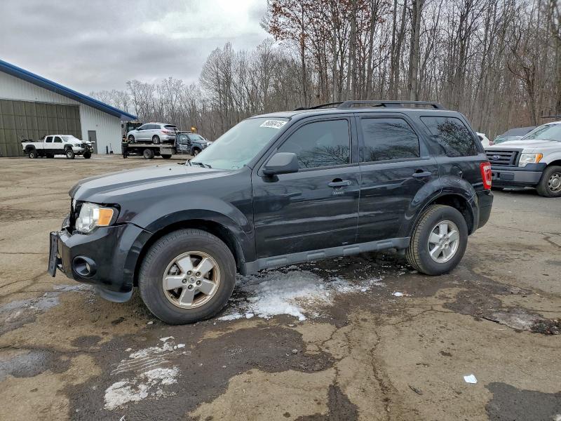 FORD ESCAPE XLT 2011 with VIN 1FMCU9DG1BKA18412 - Photo from auction
