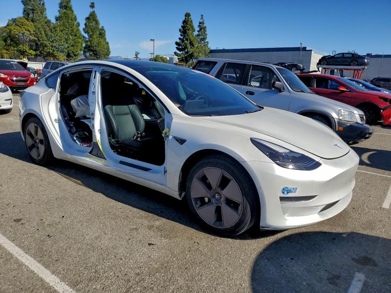 Photo 4 from auction – 2021 TESLA MODEL 3 with VIN 5YJ3E1EA7MF002678