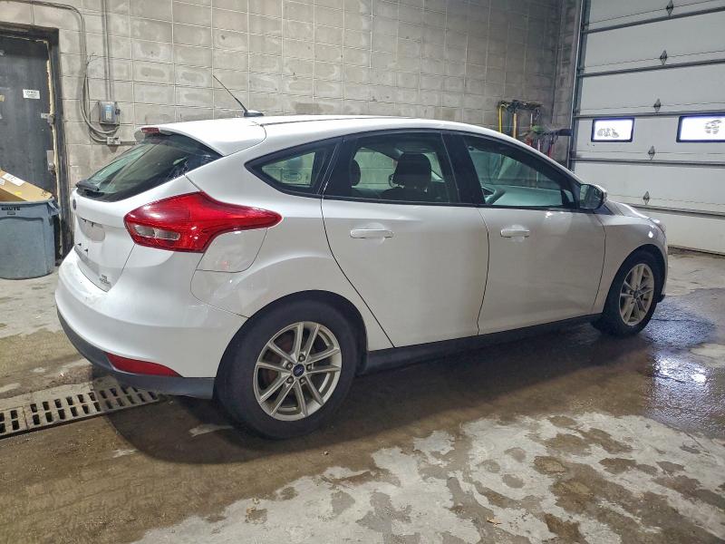 Photo 3 from auction – 2015 FORD FOCUS SE with VIN 1FADP3K23FL375911
