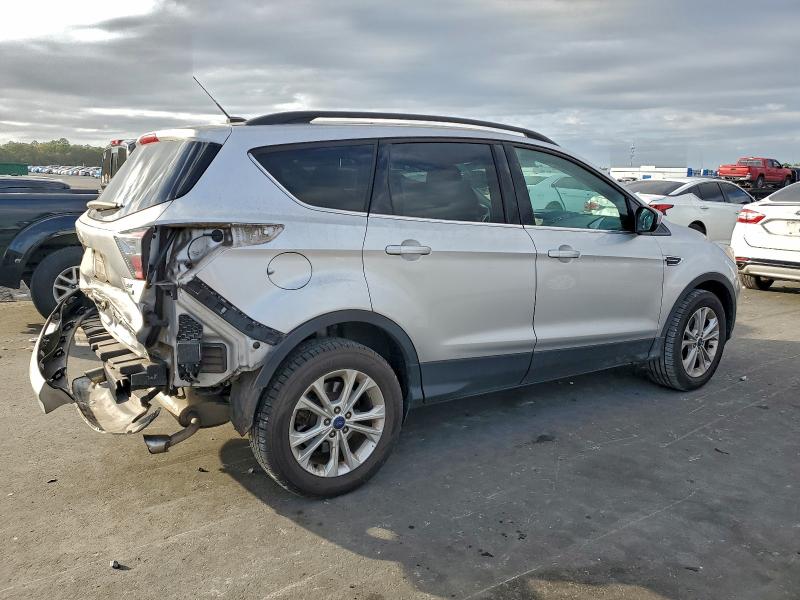 Photo 3 from auction – 2017 FORD ESCAPE SE with VIN 1FMCU0GD6HUE86534