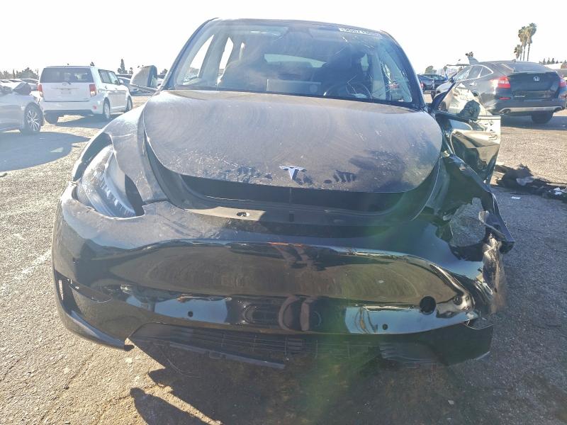 Photo 5 from auction – 2022 TESLA MODEL Y with VIN 7SAYGDEEXNF567788