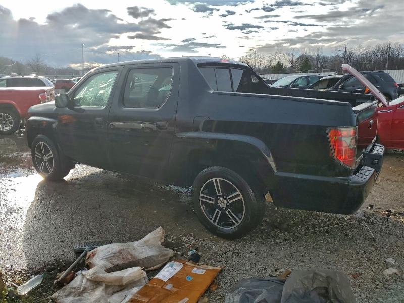 Photo 2 from auction – 2014 HONDA RIDGELINE with VIN 5FPYK1F74EB004429