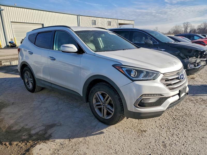 Photo 4 from auction – 2017 HYUNDAI SANTA FE S with VIN 5NMZU3LB6HH014961