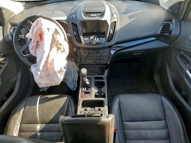 Photo 8 from auction – 2017 FORD ESCAPE TIT with VIN 1FMCU0JD9HUC94436
